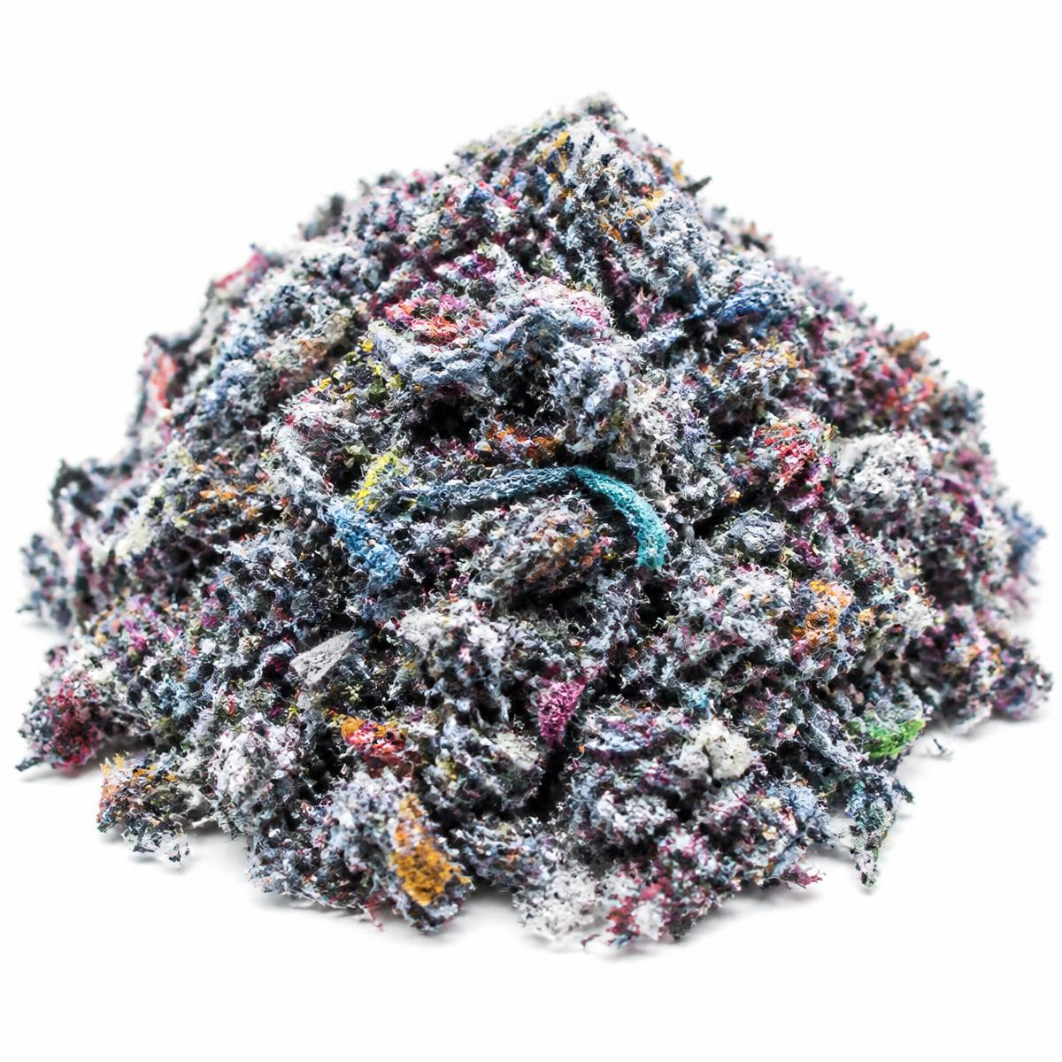 Shredded mixed textile fibre feedstock